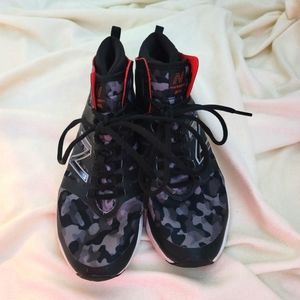 Black and Gray Camo Hightops with red detail by New Balance. Size 8.5